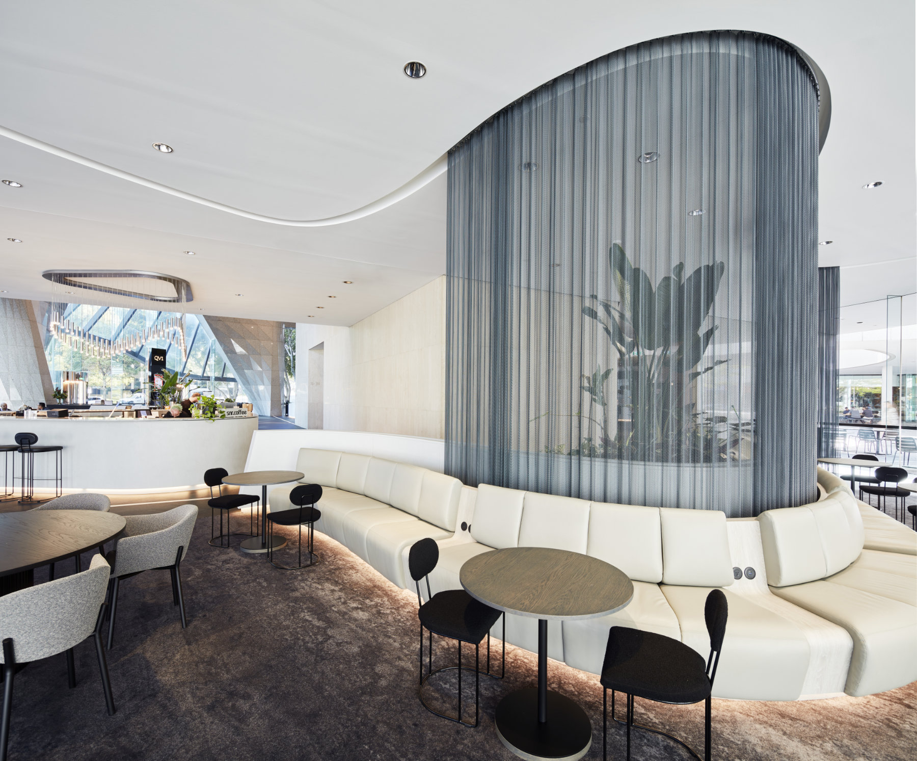 Fabricoil Interior Drapery, Metal Mesh Partition, Steel Coiled Wire Fabric in Gunmetal Black with Steel Secura Track Attachment System at QV1 Lobby, Australia - Plus Architecture